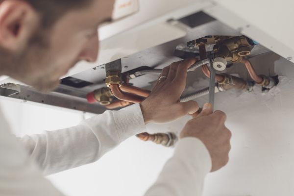 professional-plumber-checking-a-boiler-2021-09-02-16-30-58-utc68B2E964-E4F6-DA78-E544-B645186D1C4C.jpg
